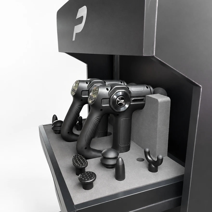 The top shelf of the Recovery Station from the side, the ProGun IR in their cradle
